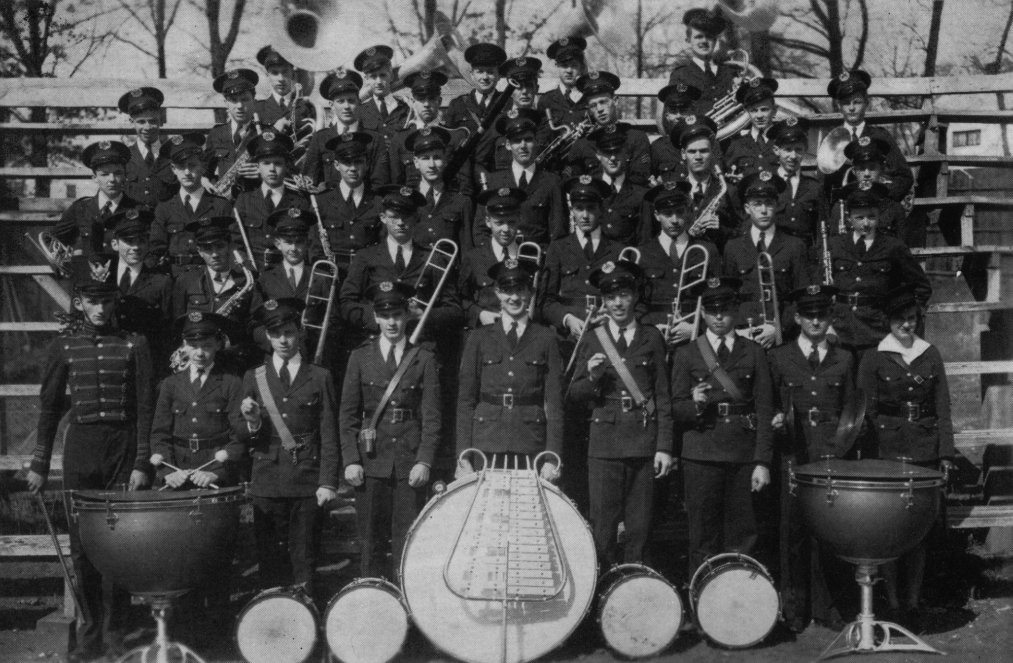 1939 Central High School Band in new red jackets, hats, and black pants uniforms